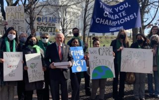 Senator Edwards joins advocates to receive his "Climate Champion" award from CCAN.