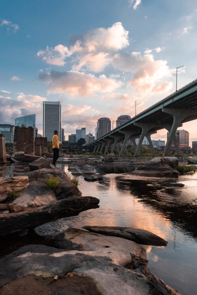 Person by James River at Sunrise – James River – Siddharth Kumar James River at sunrise – Richmond, Va. Photo by Siddharth Kumar.