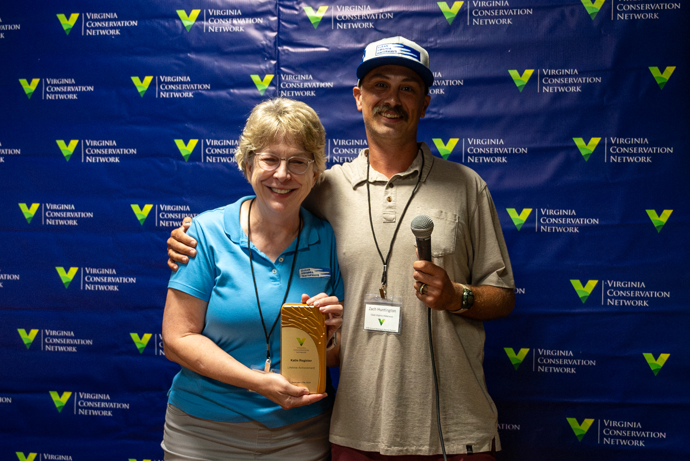 Katie Register receives Lifetime Achievement Award from Zach Huntington