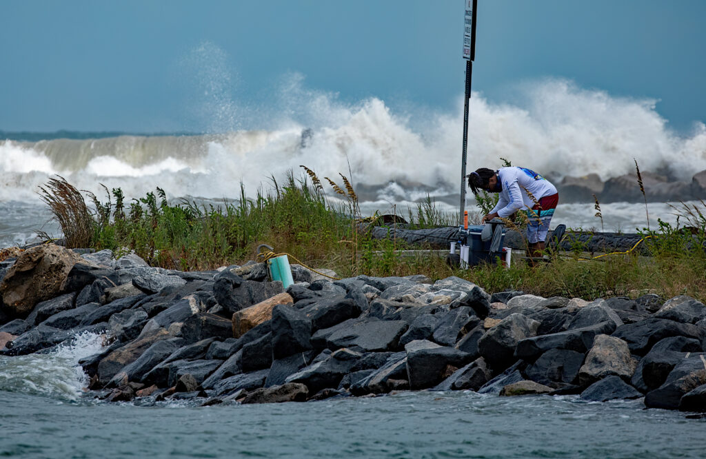 Fisherman prepares net_Rudee Inlet_Virginia Beach_Michael Schimmel (@birdmanfoto52)